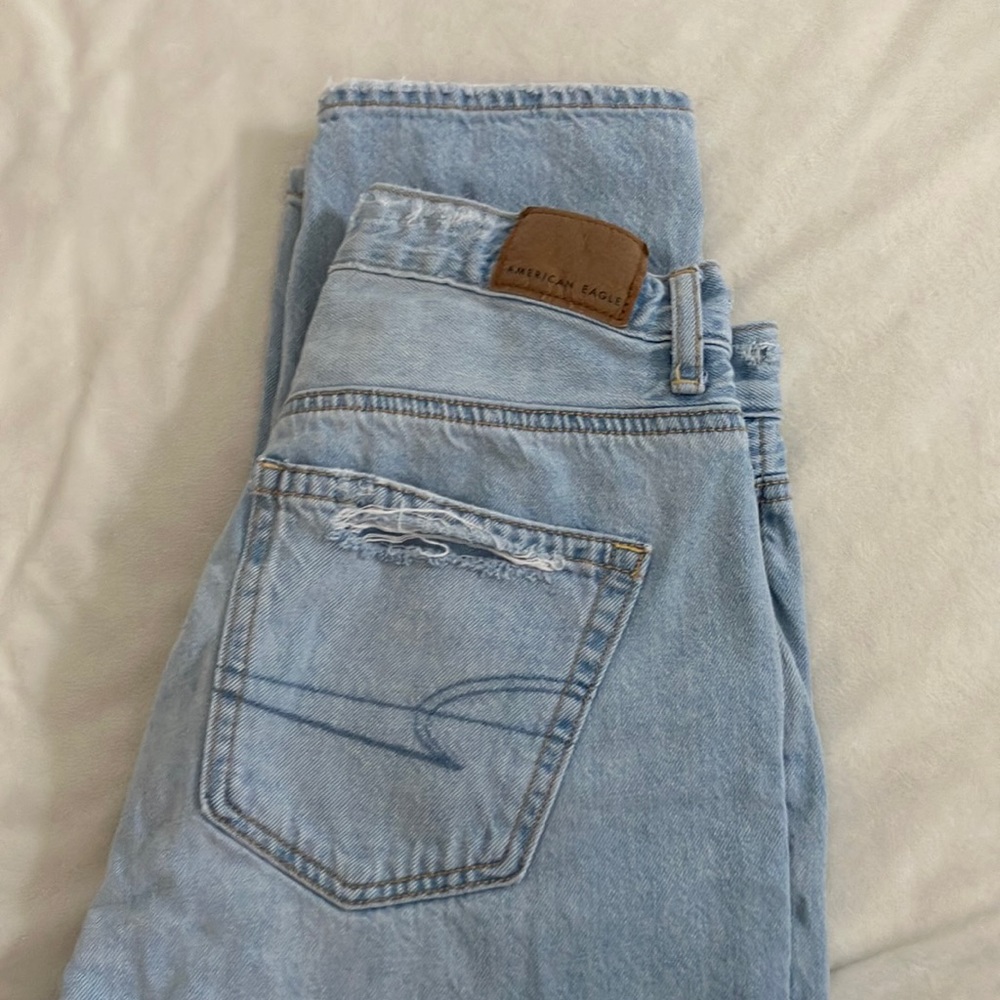 AE ripped light jeans